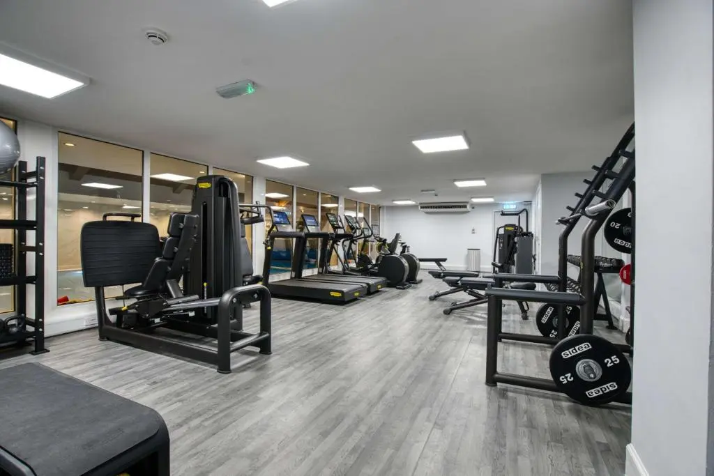 a gym with lots of treadmills and lots of machines at Inverness Palace Hotel & Spa, WorldHotels Distinctive in Inverness