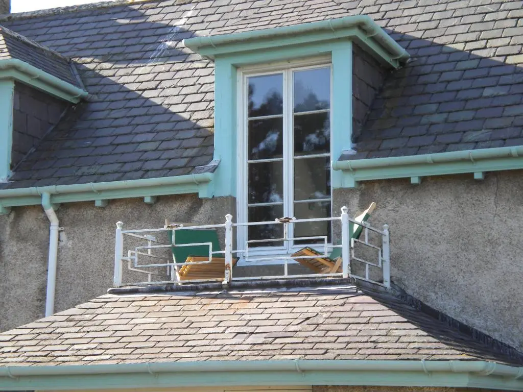 a window on the roof of a house at Auchencairn Cottage in Brora