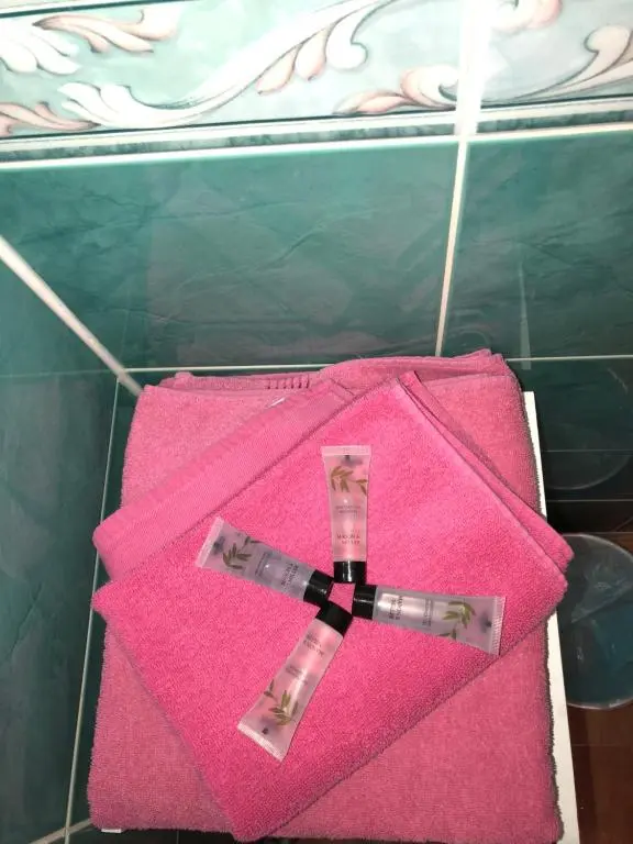 a pink bag with a bow on top of it at Fairwinds in Inverness