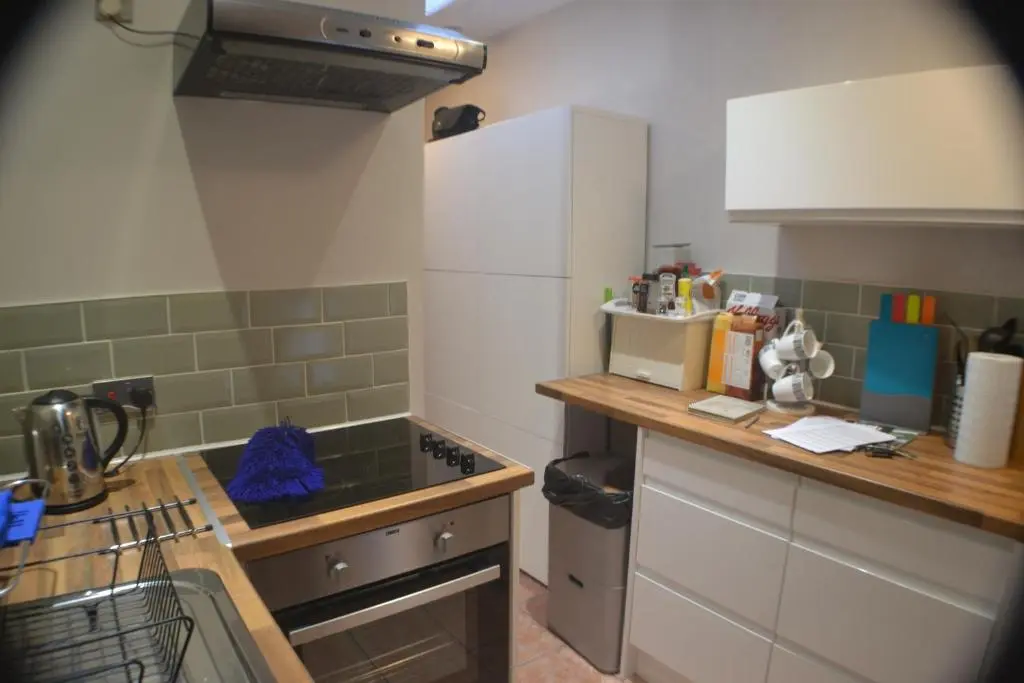 a kitchen with a sink and a counter top at Strathallan B&B in Inverness