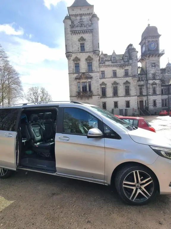 a white van parked in front of a castle at Doric House in Inverness