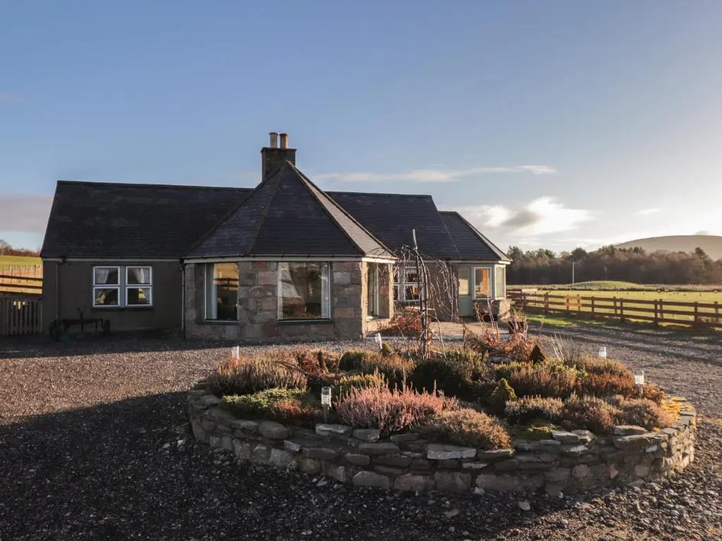 a house with a garden in front of it at Bogairn in Carron