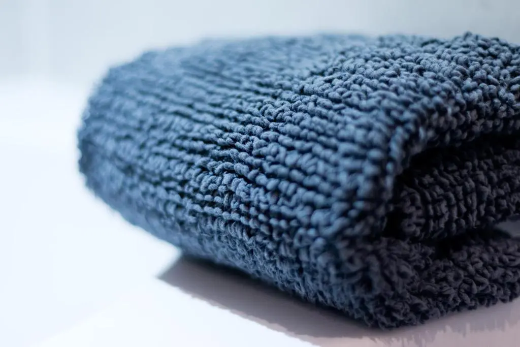 a blue towel sitting on top of a table at Leys Hotel in Aberdeen