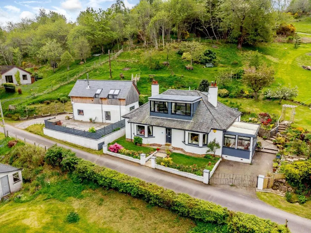 an aerial view of a house at Urquhart Bay B&B in Drumnadrochit