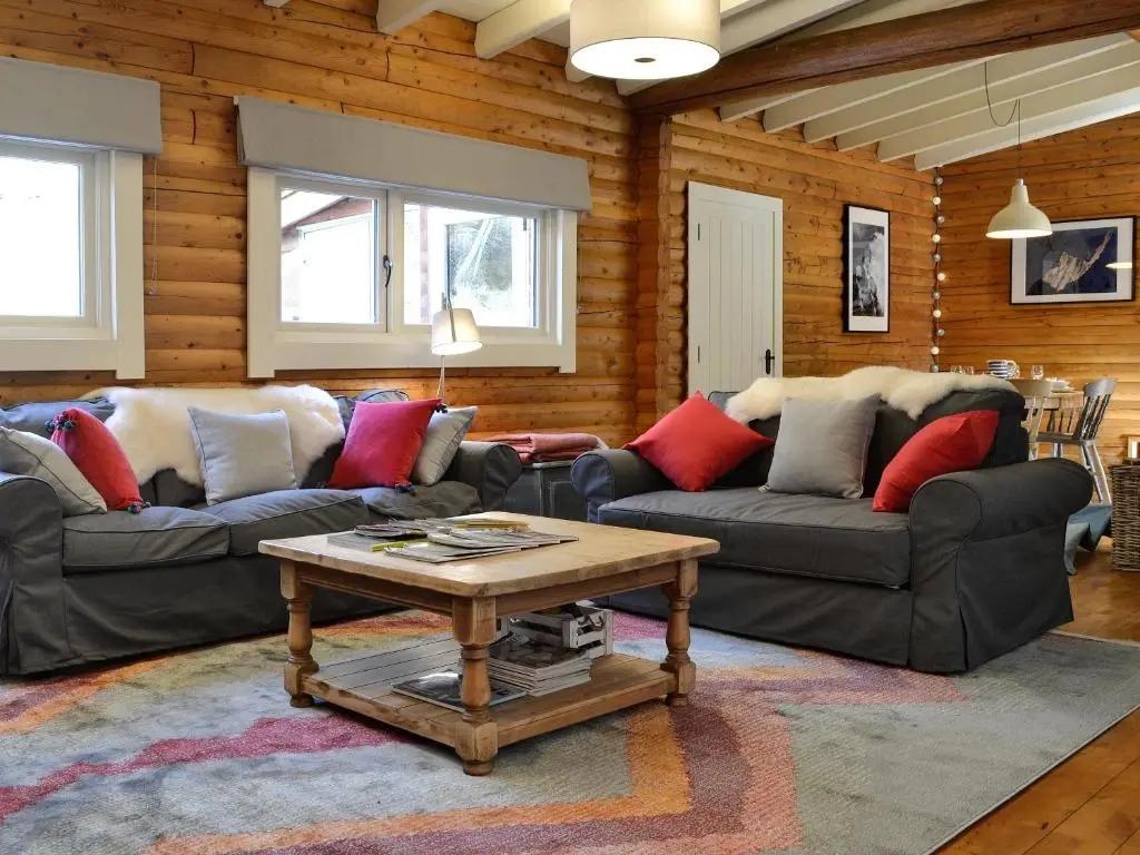 a living room with two couches and a coffee table at Glen Hideaway in Balnald