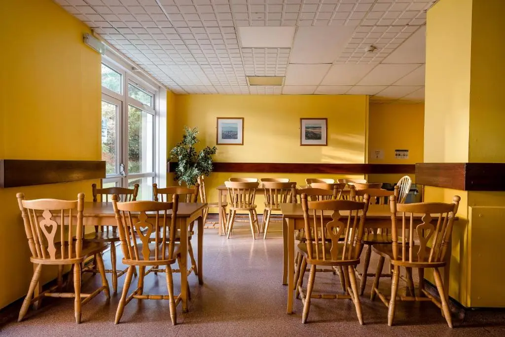 a dining room with a table and chairs at Inverness Youth Hostel in Inverness