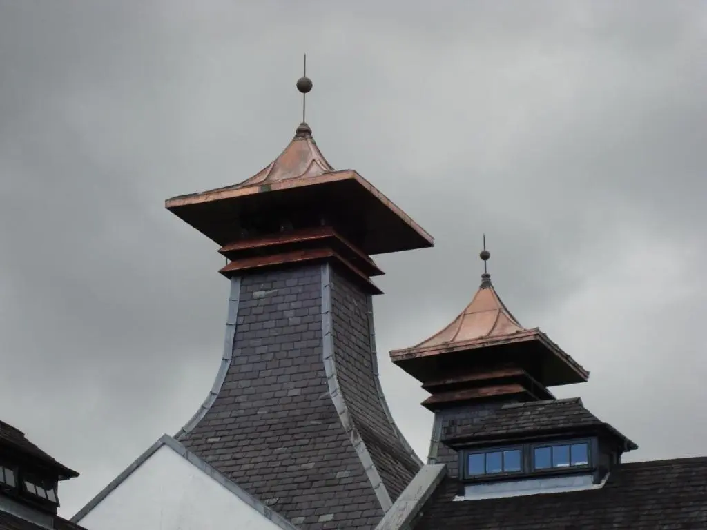 a roof with two towers on top of a building at Willowbank in Grantown on Spey