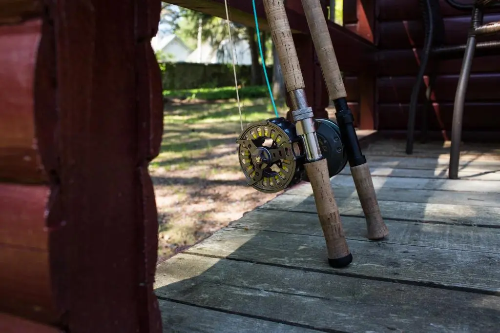 a row of stools are tied to a porch at Invercauld Lodges in Ballater