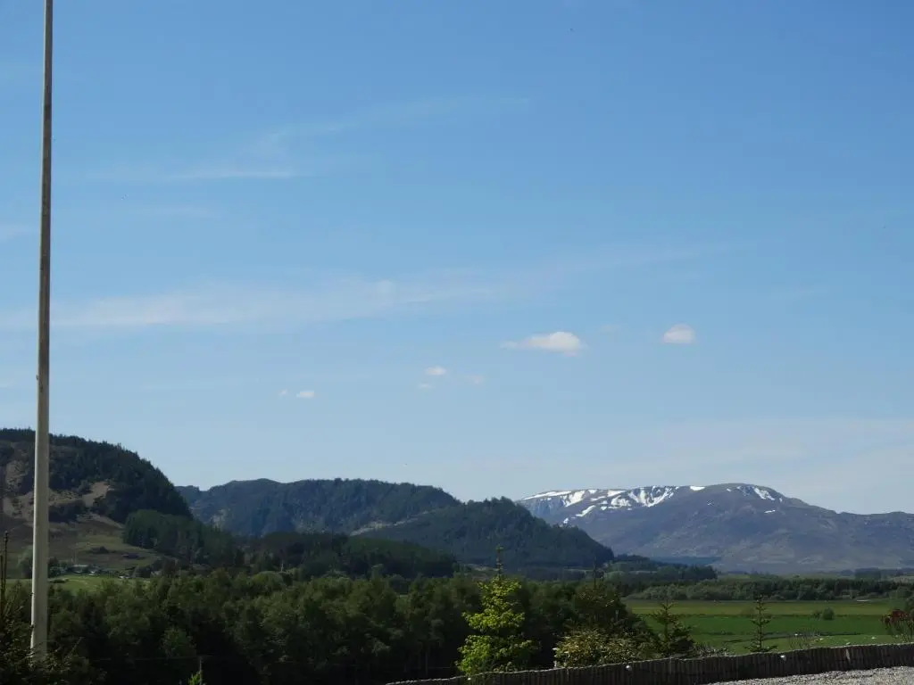 a view of a mountain range with snow at Laggan Hotel in Laggan