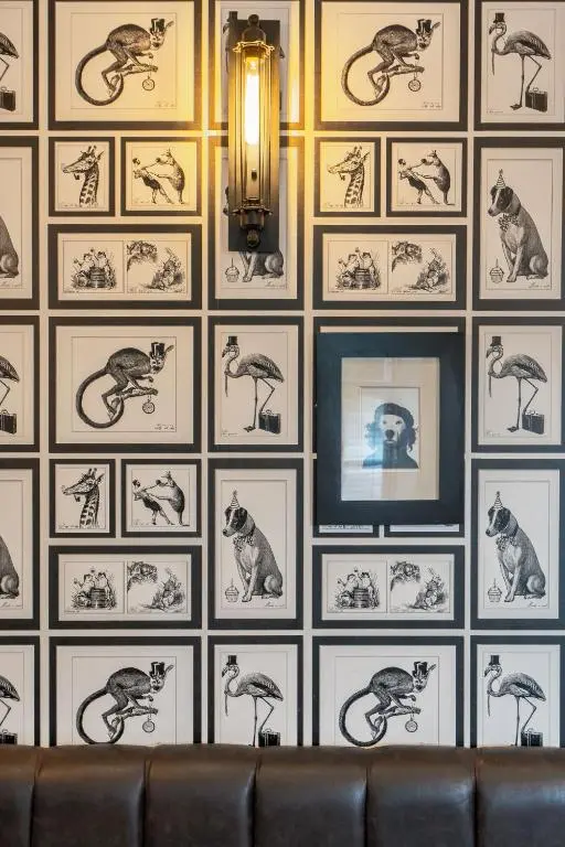 a wall with pictures of animals on it at Banchory Lodge Hotel in Banchory