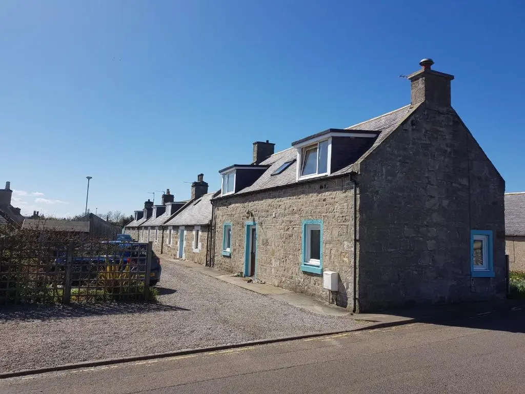 a row of houses on the side of a street at 6 Seatown, Lossiemouth in Lossiemouth