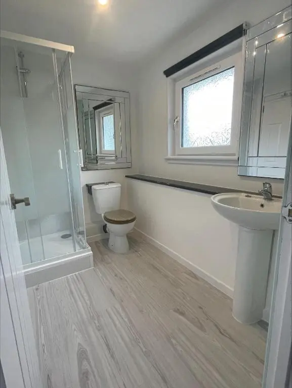 a bathroom with a toilet and a sink at No.9 in Inverness