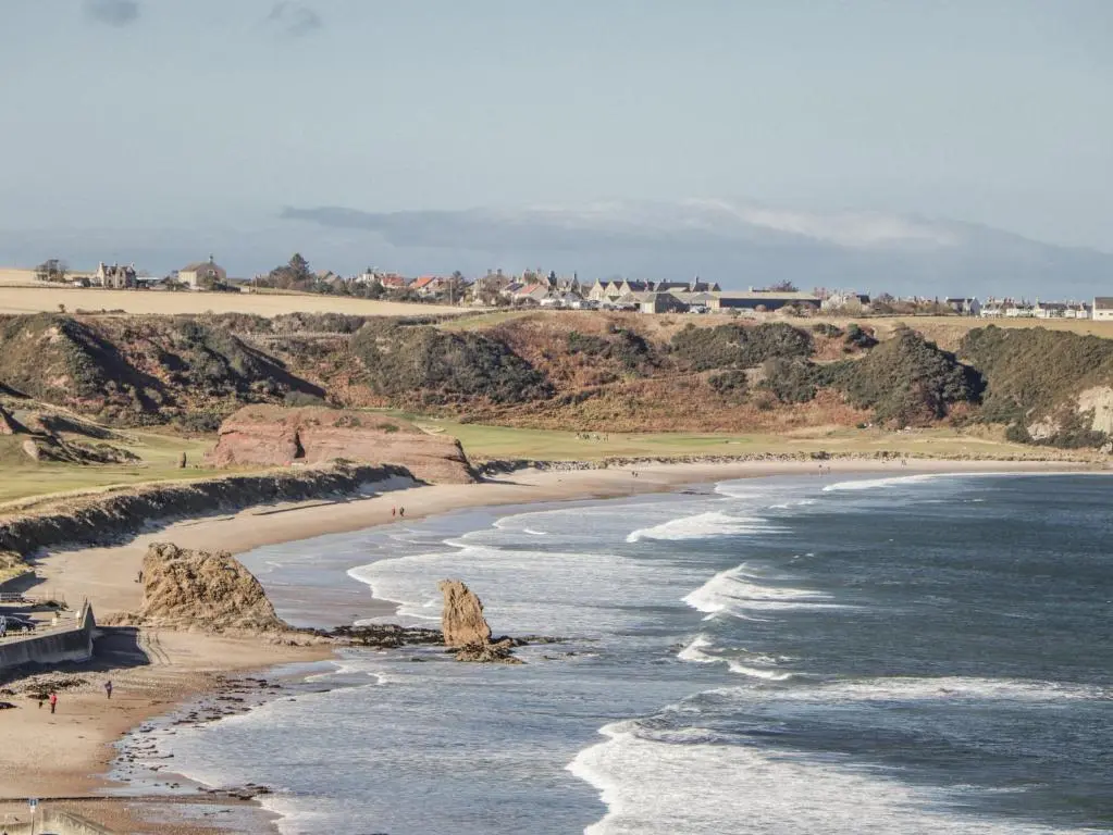 a view of a beach with people walking on it at 83 Seatown in Buckie