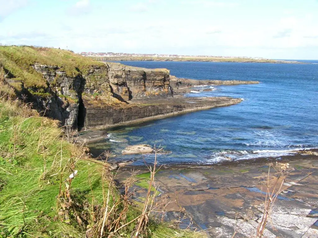 a view of the ocean with a rocky coastline at Harbour House Bed & Breakfast - Wick in Wick