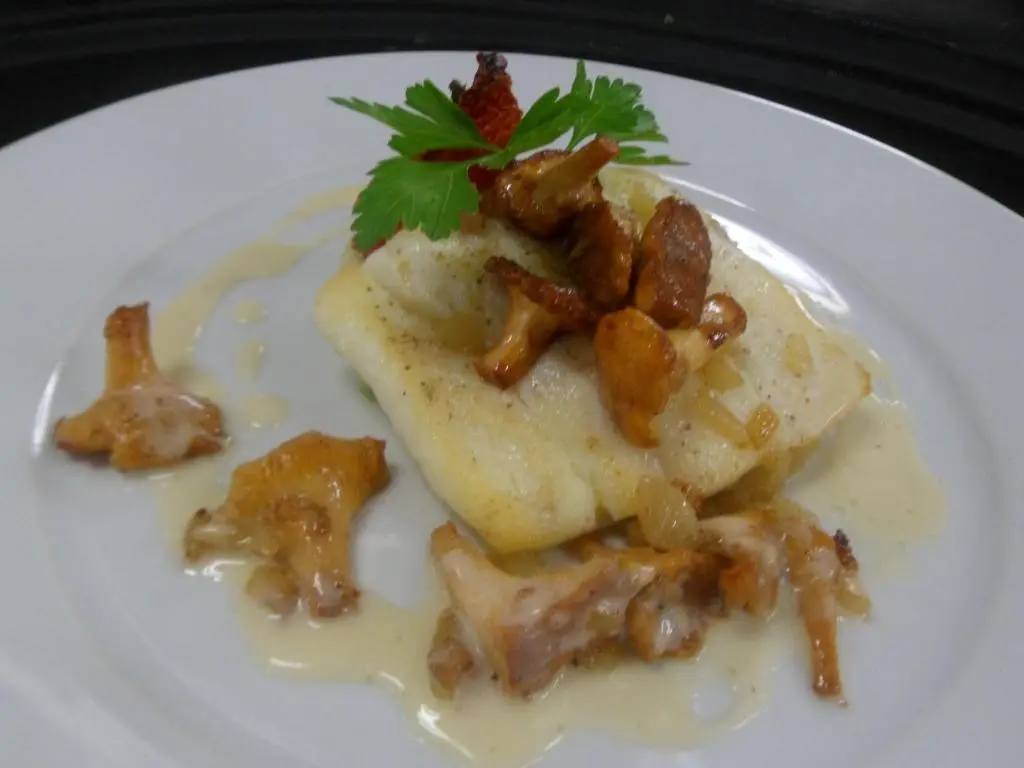 a white plate with a piece of food on it at The Speyside Hotel and Restaurant in Grantown on Spey