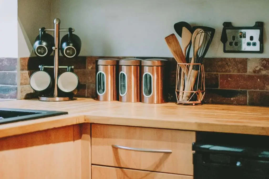 a kitchen counter with pots and pans and utensils at The Black Isle Retreat in Inverness