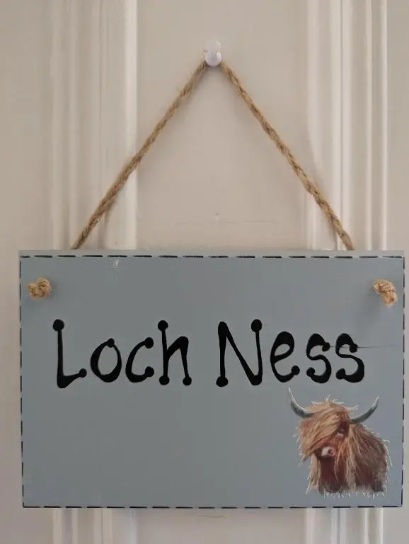 a sign that reads lockess hanging on a door at The Coo's Guest House in Inverness