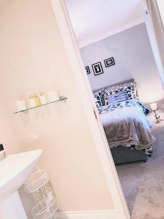a room with a bed in a small room at The Maples 26 Wellingtonia Court in Inverness