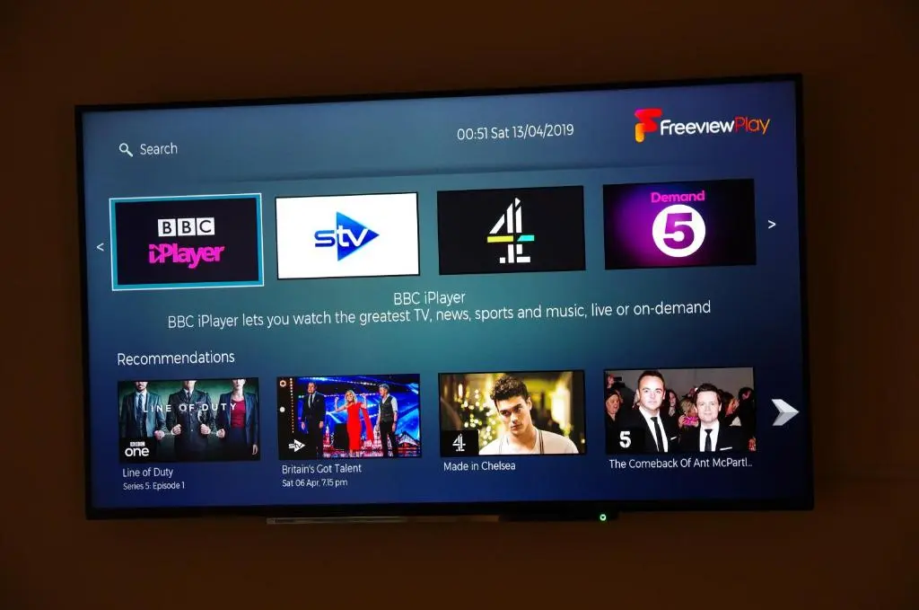 a television screen with a bunch of different websites at STAG City Centre apartment in Inverness