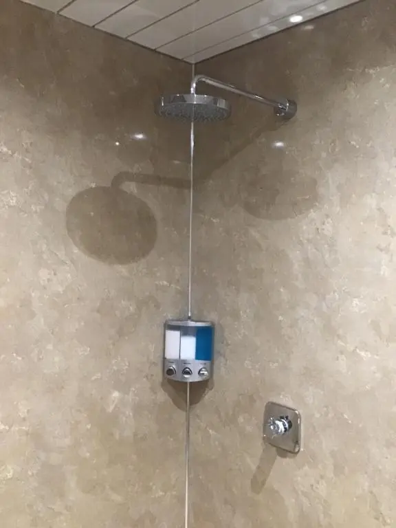 an overhead view of a television hanging from a ceiling at Exclusive Private double room, en-suite wet room Private entrance in Forres