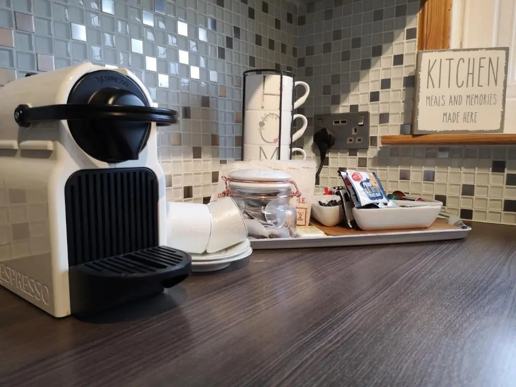 a coffee maker sitting on a counter in a kitchen at Perfect Stay Apartments No.20 in Inverness