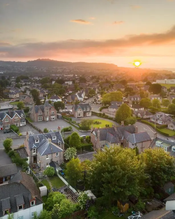 a view of a residential suburb at sunset at West of the Ness in Inverness