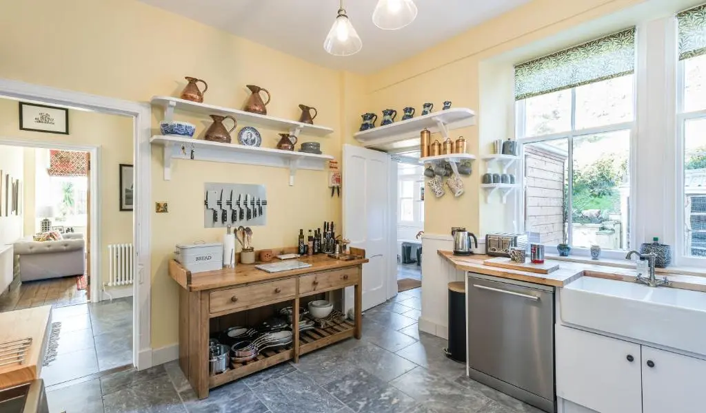 a kitchen with a counter and a sink at The Old Manse, Loch Ness (highland-escape) in Inverness