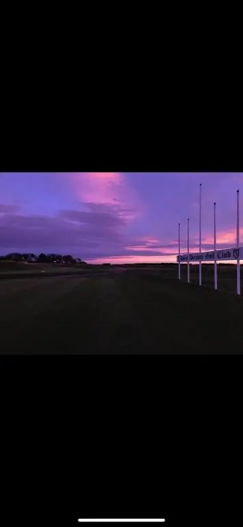 a television screen with a purple and purple sky at 23 C Allan Gardens in Dornoch