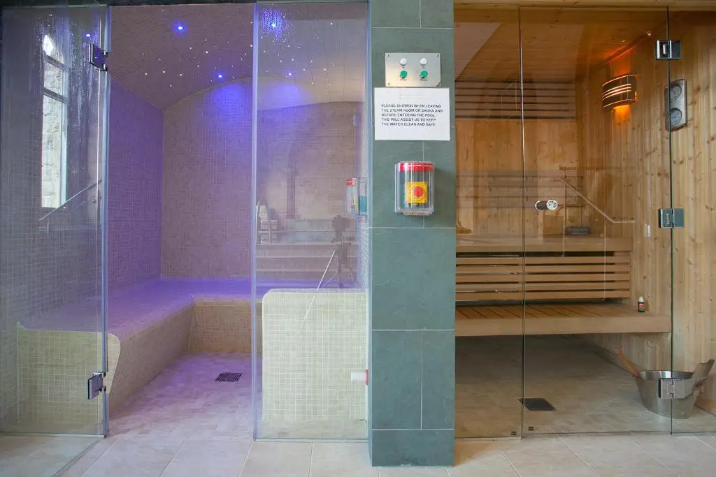 a shower stall in a room with at Loch Ness Abbey Cottages in Fort Augustus