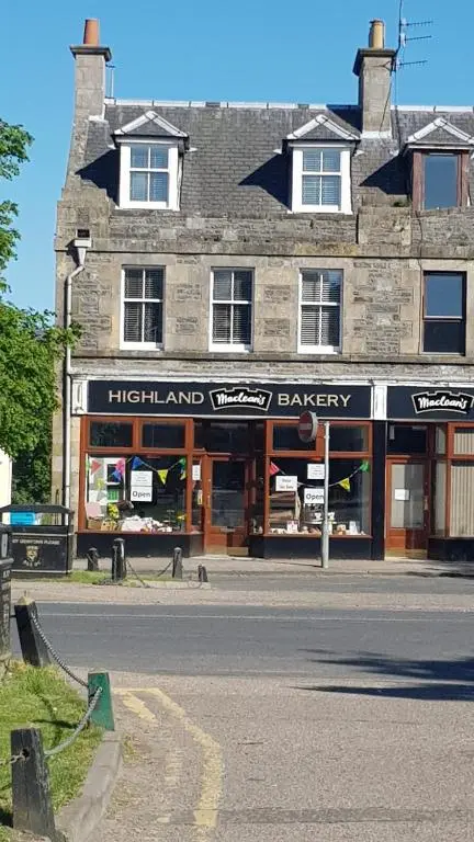 a building on the side of a street at The Granary in The Square in Grantown on Spey