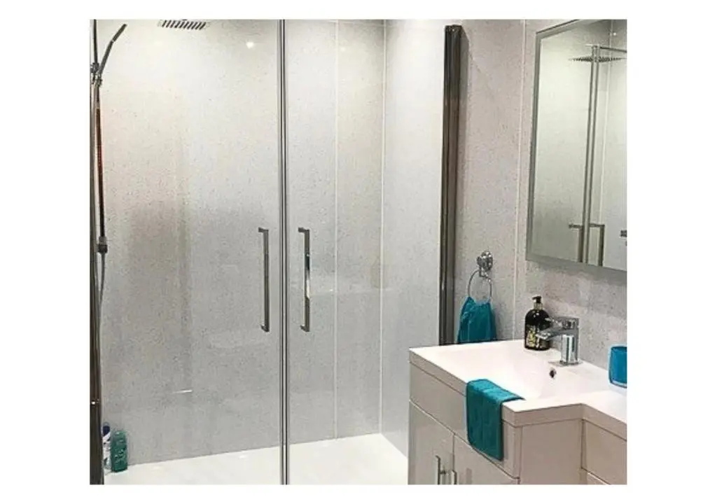 a bathroom with a shower with a sink and a toilet at Stunning 7 Bedroom Bungalow Alford Aberdeenshire in Alford