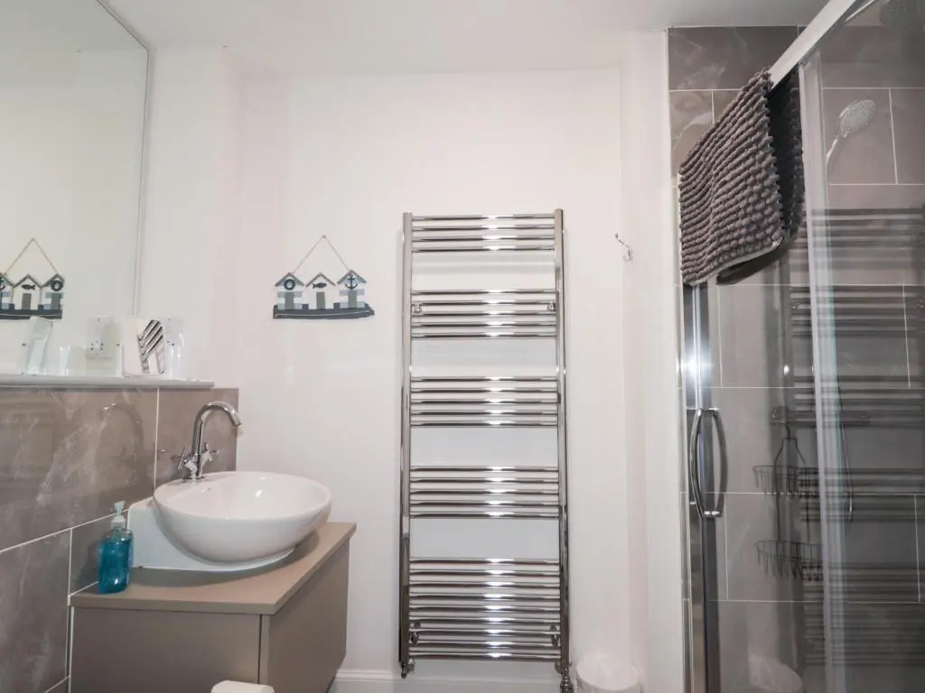 a bathroom with a sink and a shower at The Nook in Inverness