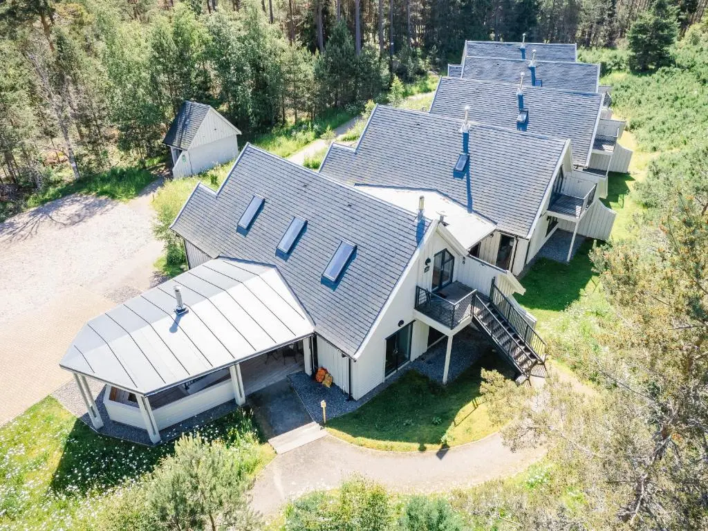 an aerial view of a row of houses at Wildcat Lodge in Kingussie