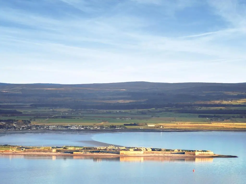 an island in the middle of a large body of water at Callachy Cottage - Uk7047 in Glenurguhart