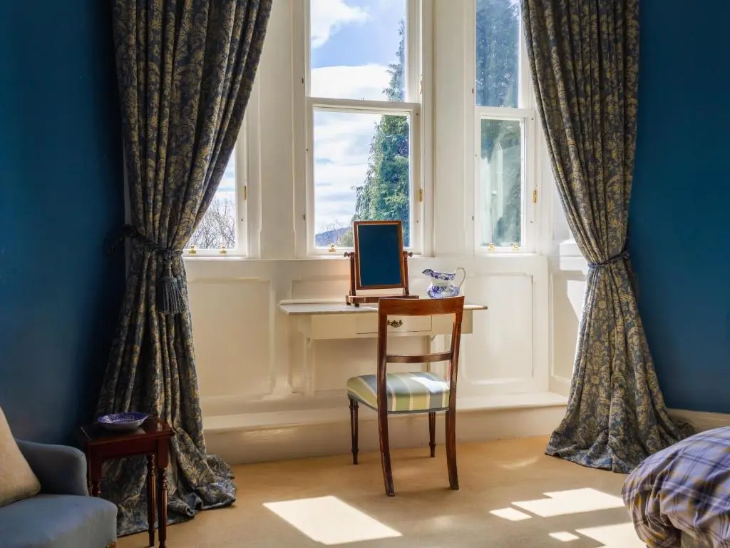 a room with a desk and a chair and a window at Dalnaglar Castle - Uk7072 in Cray