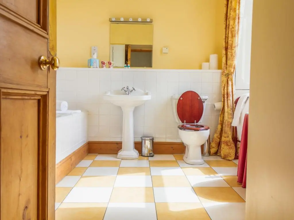 a bathroom with a toilet and a sink at Dalnaglar Castle - Uk7072 in Cray