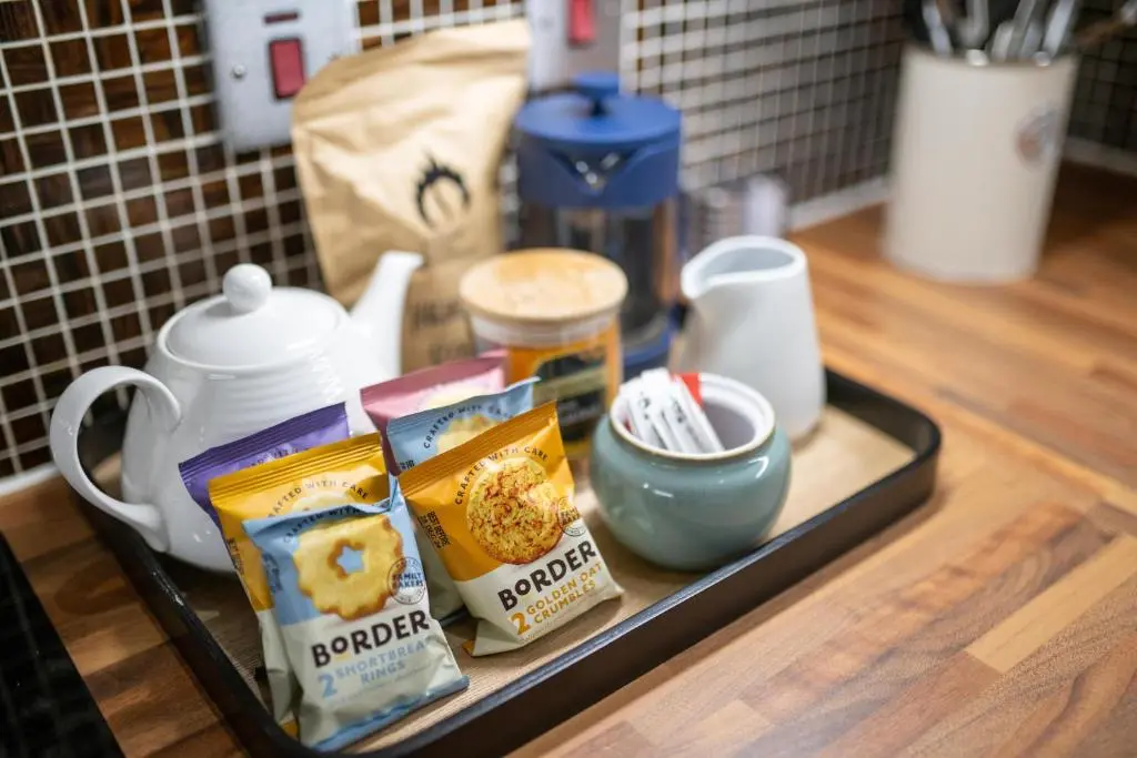 a tray with food on a counter with a tray of food at Old Edinburgh Court in Inverness