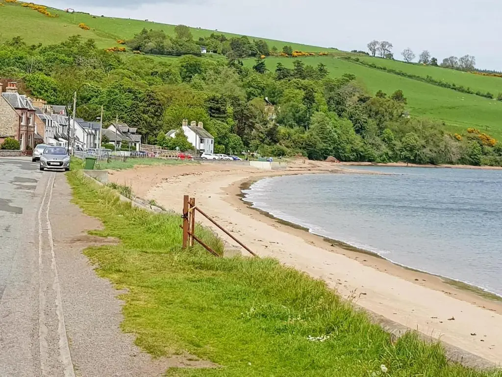 a car parked on the side of a beach at The Red Kite - Uk31003 in Avoch