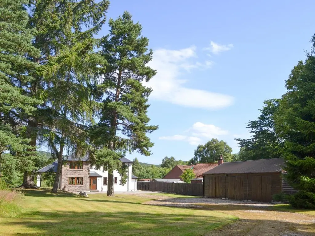 a view of the house from the yard at Battanropie Lodge in Carrbridge