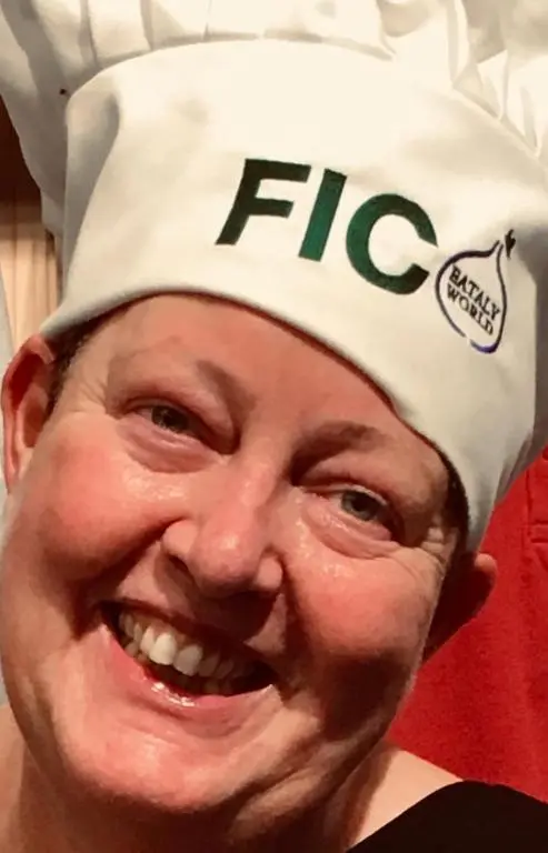 a man wearing a chefs hat with the word fire on it at Shamerbrea The Foodie B&B in Inverness