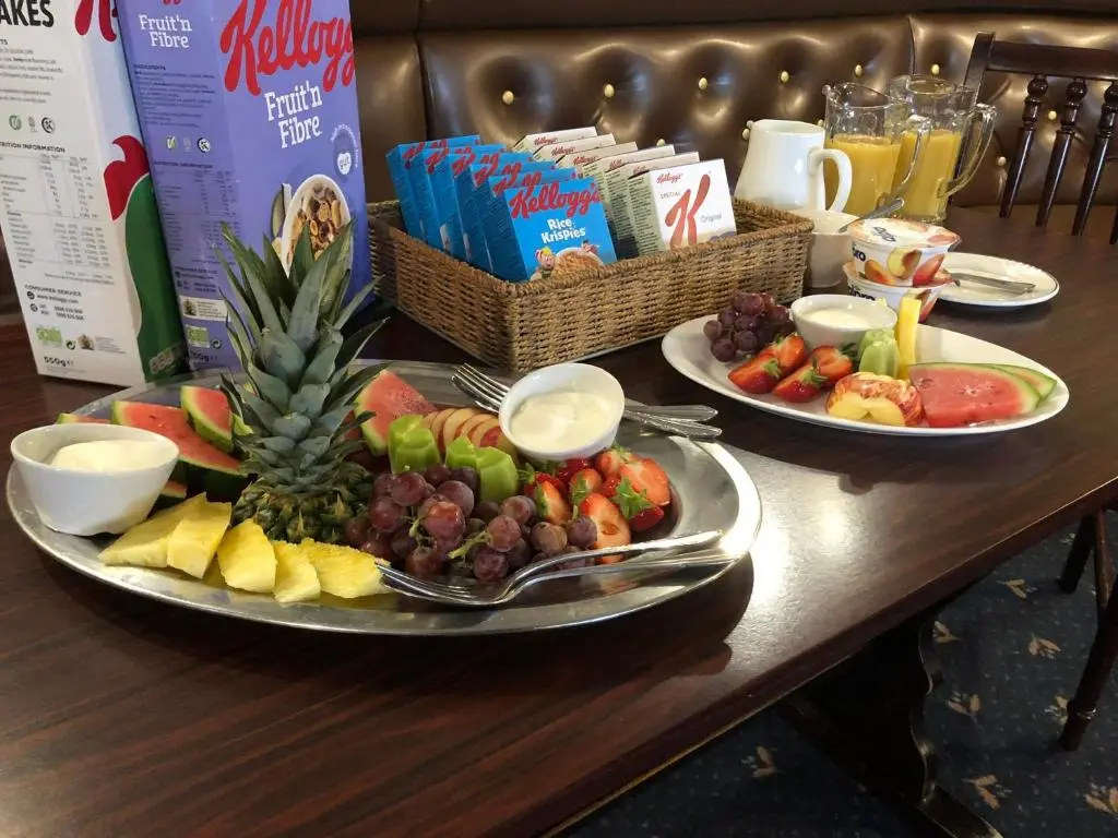 a table with two plates of food on it at The Aberdeen Arms Hotel in Tarves