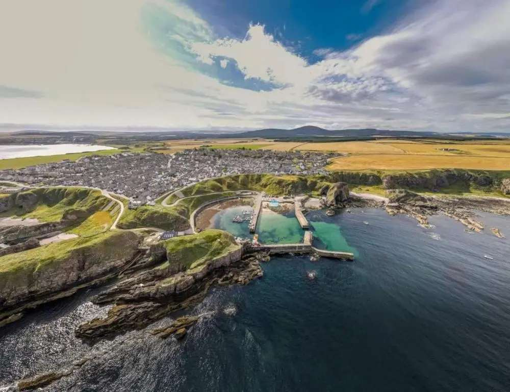 an aerial view of a bridge over a body of water at 4-Bed Cottage in Portknockie Near Cullen Moray in Portknockie