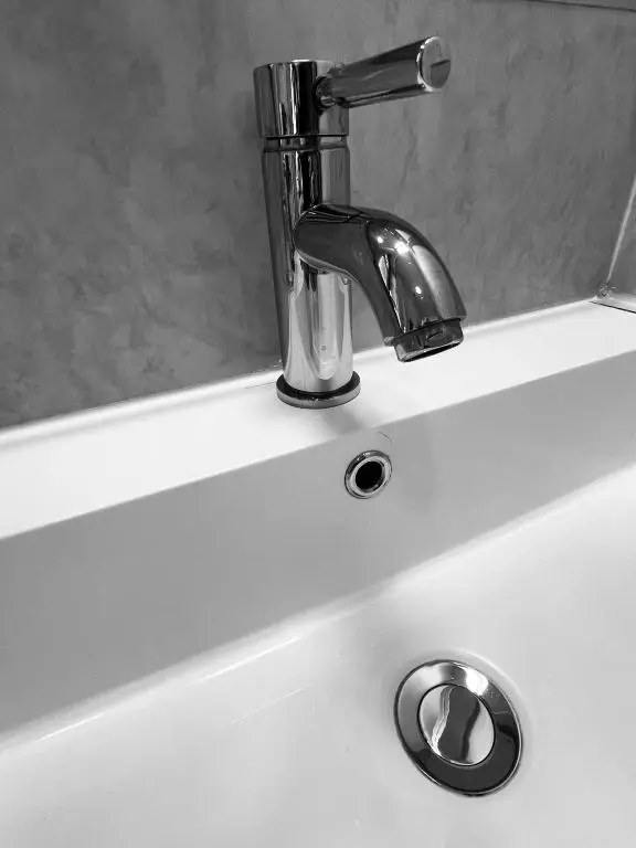 a sink with a faucet on top of it at Talisker in Nairn