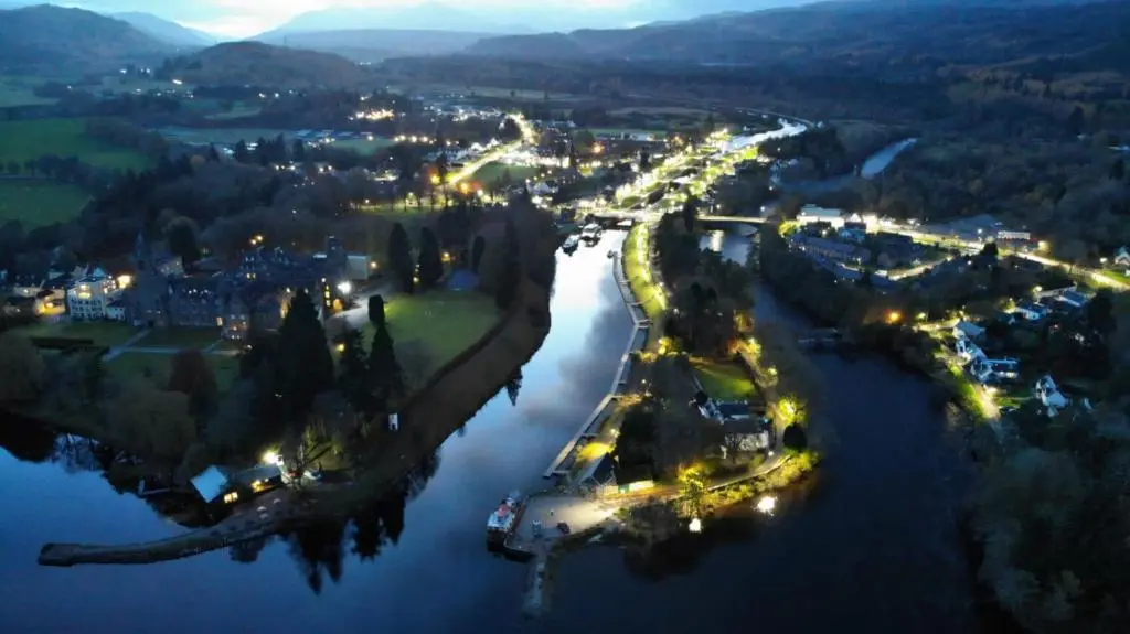 an aerial view of a river at night at Loch Ness Pods in Fort Augustus