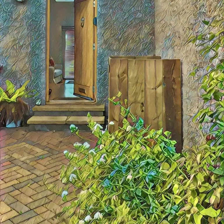 a painting of a house with a door and a bush at Balnakyle in Inverness