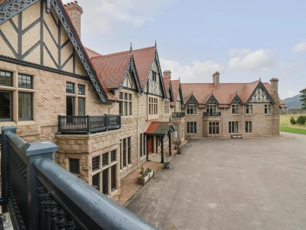 an aerial view of a building with a courtyard at Macdui - Mar Lodge Estate in Ballater