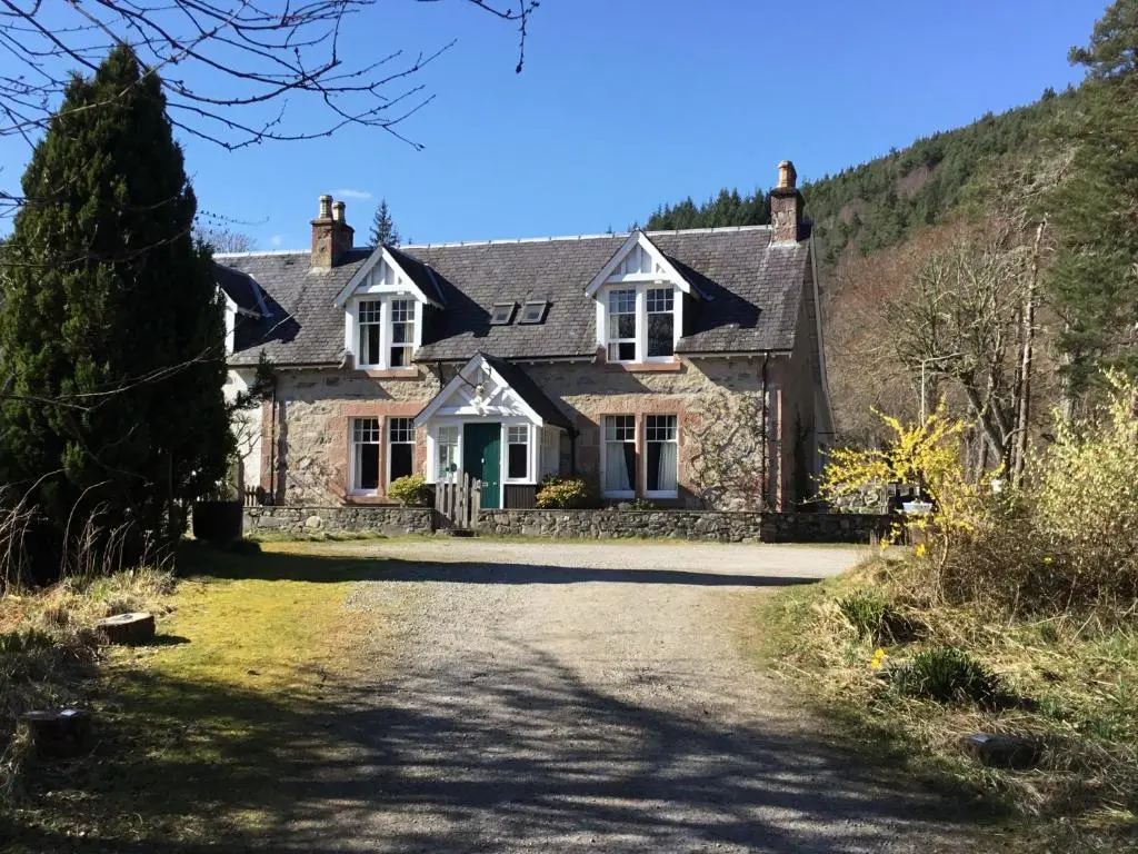 a house on the side of a hill at Westward Bed and Breakfast in Cannich