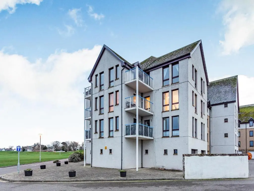 an image of a white building with balconies at Moray Firth View in Nairn