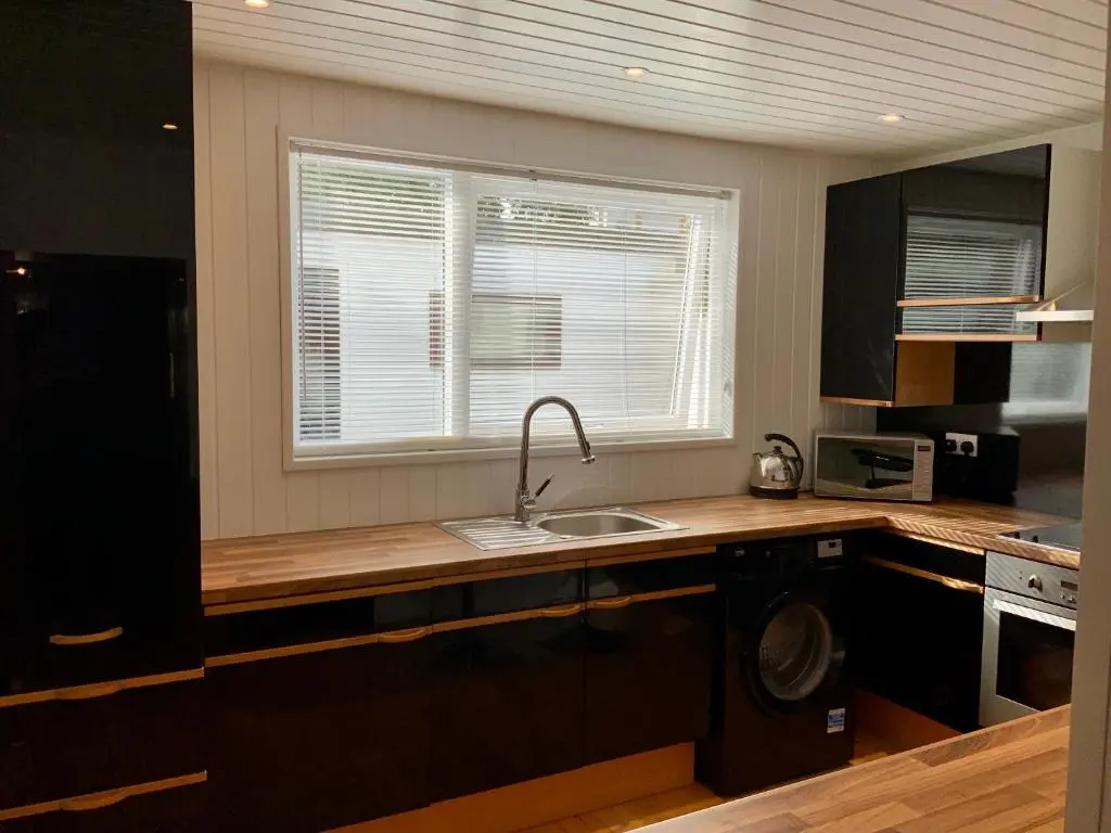 a kitchen with a sink and a window at No 10 The Cottage in Inverness