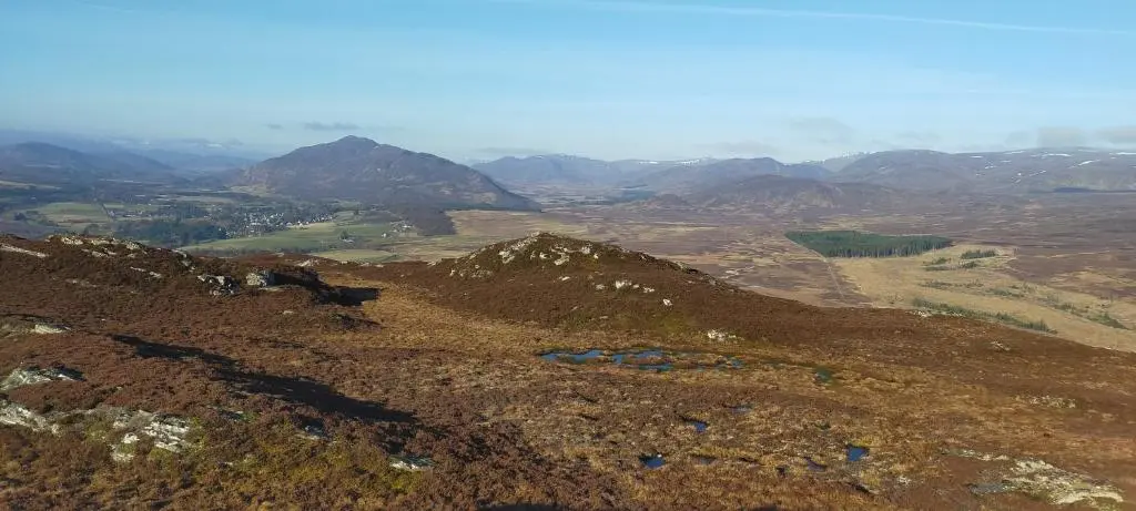 a view of a mountain with mountains in the background at Ardvonie House in Kingussie